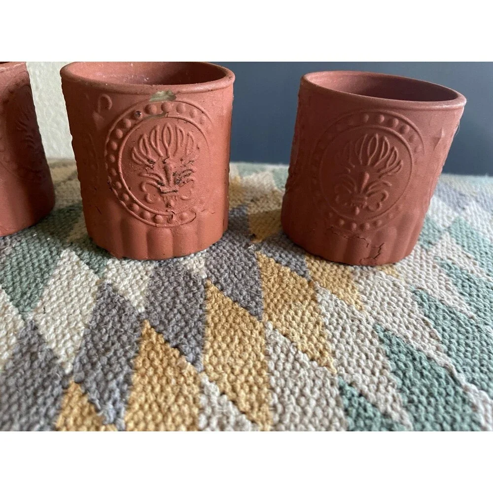 Painted small terra cotta style planters set of 4